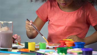 young girl painting